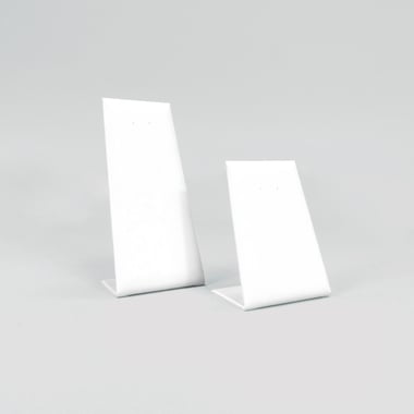 2 multi-purpose stands covered in white leatherette 